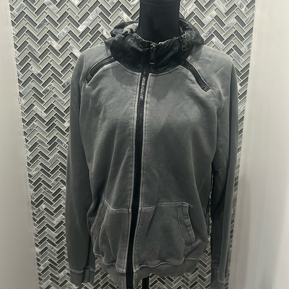 Used jacket have have a bleach stain and one stain mark